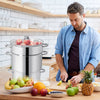 11-quart stainless steel fruit juicer steamer with apples inside, ideal for making fresh juice and syrup.