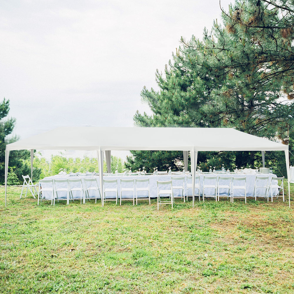 10 x 30 feet canopy tent with removable sidewalls, set up on grass for outdoor parties and weddings.