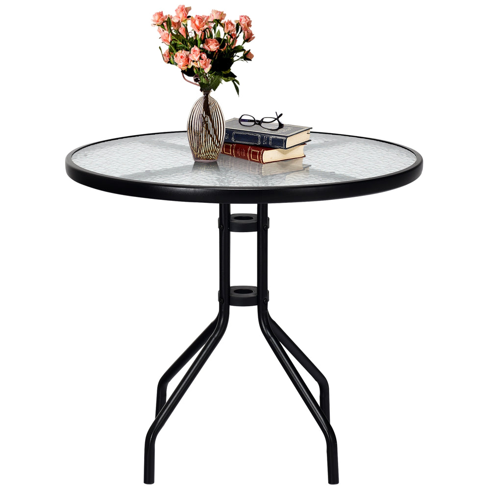 Round 32-inch outdoor patio table with tempered glass top and umbrella hole, ideal for indoor and outdoor use.