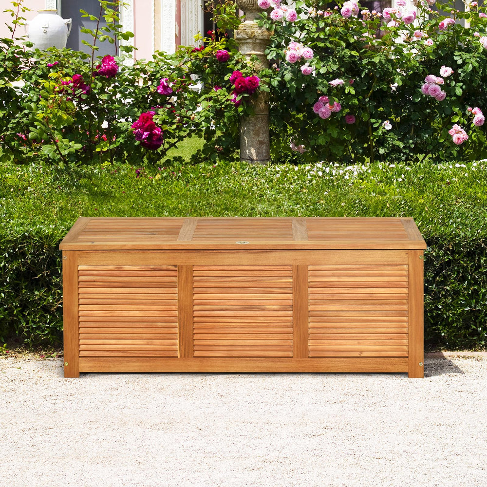 Acacia wood storage bench box with a sleek design, providing 46-gallon capacity for outdoor essentials in garden.