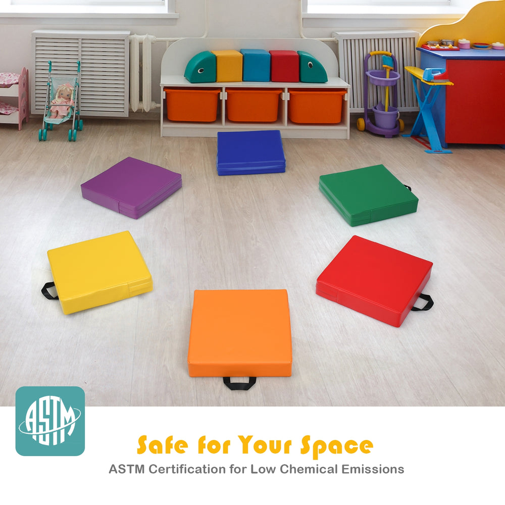 Colorful 15-inch square toddler floor cushions made of durable foam, featuring handles for easy carrying and stacking.