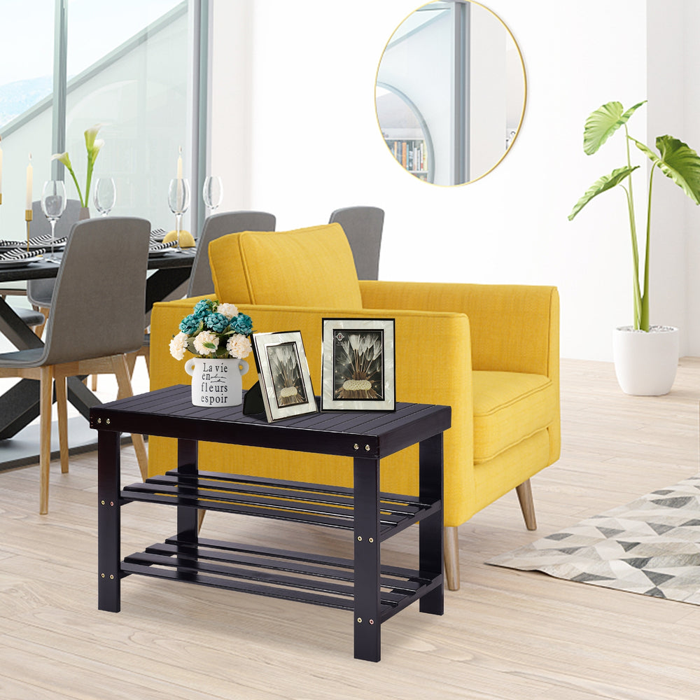 Black 3 tier bamboo bench storage shoe shelf with decorative items, ideal for living room or bedroom use.