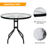 Round 32-inch outdoor patio table with tempered glass top and umbrella hole, featuring a stylish black steel frame.