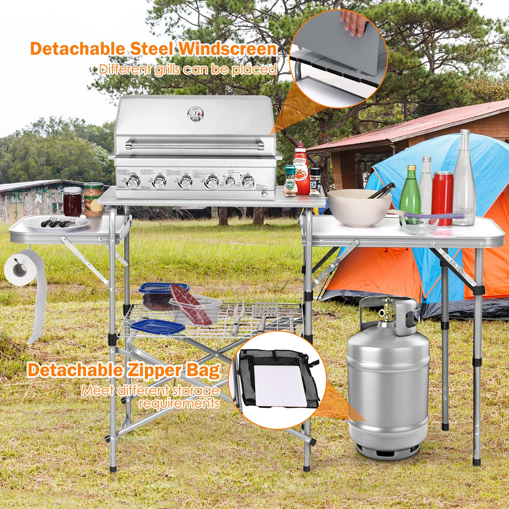 Foldable outdoor BBQ grilling table with detachable windscreen and zippered bag, ideal for camping and cooking supplies.