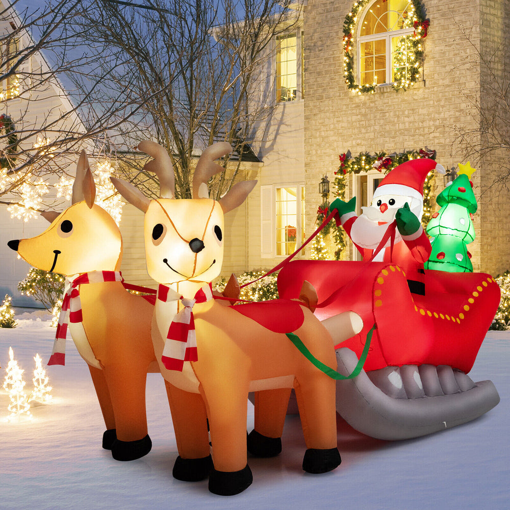 Inflatable Santa on sled with two reindeer, 7.2 feet long, featuring LED lights for festive outdoor decoration.