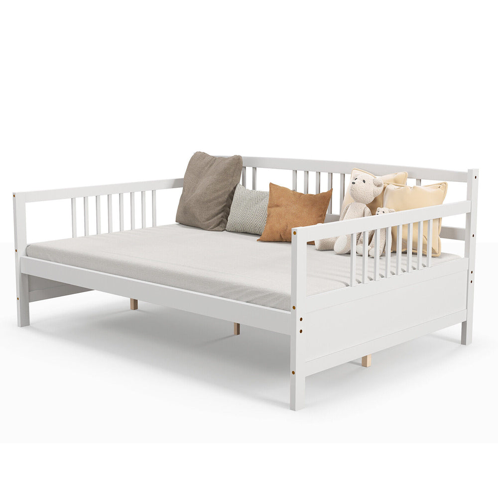 White wooden full-size daybed frame with guardrails, featuring cushions, ideal for versatile living spaces.