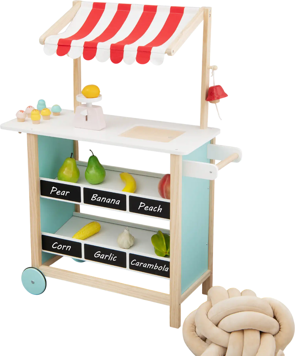Kids wooden ice cream cart in red with chalkboard, storage shelves, and toy accessories for imaginative play.