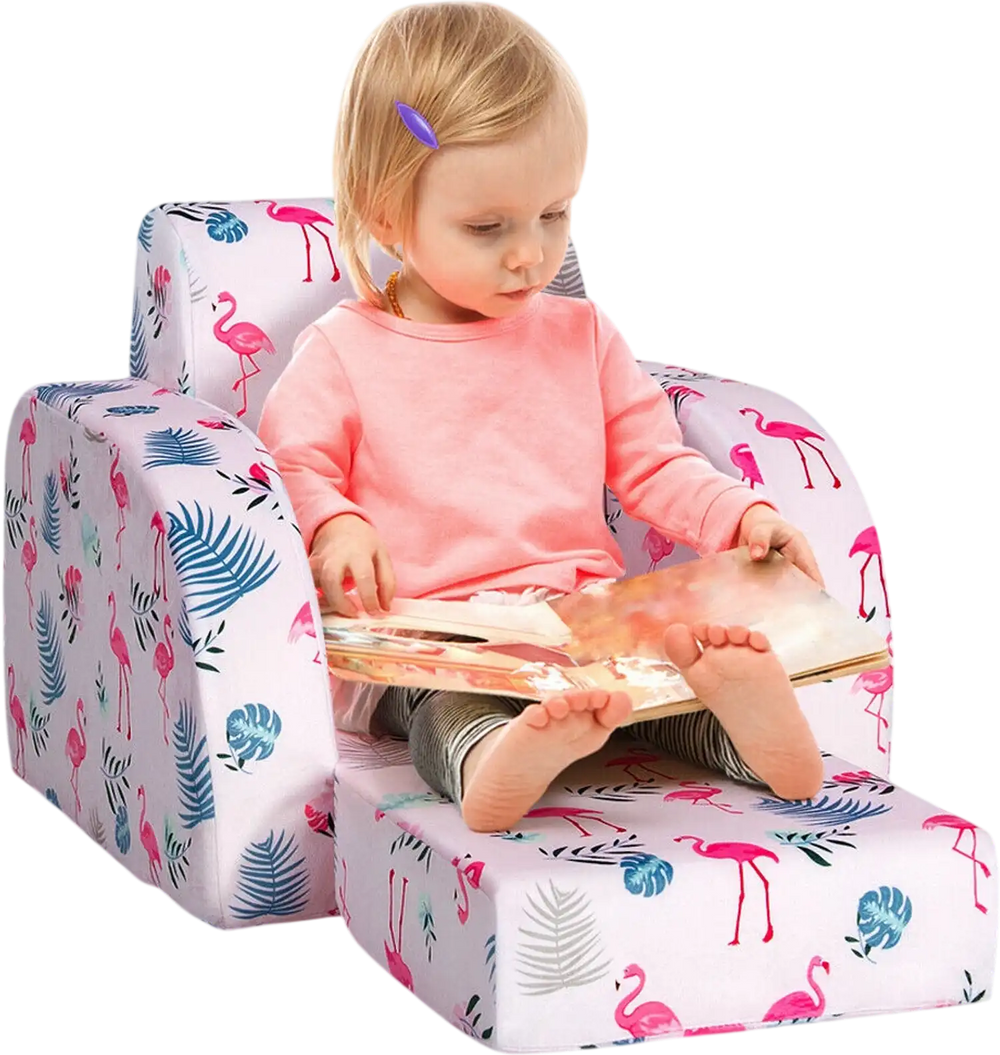 Convertible pink kid sofa bed with flamingo patterns, designed for comfort and relaxation in a playroom setting.