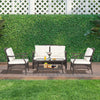 4-piece outdoor rattan conversation set with soft cushions, ergonomic design, and a stylish coffee table for patio.