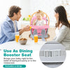 Convertible baby high chair in pink, used as a booster seat with adjustable tray for dining at home or restaurants.