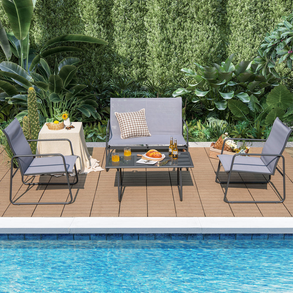 4-piece metal patio furniture chat set with tempered glass coffee table, ideal for outdoor relaxation by the pool.