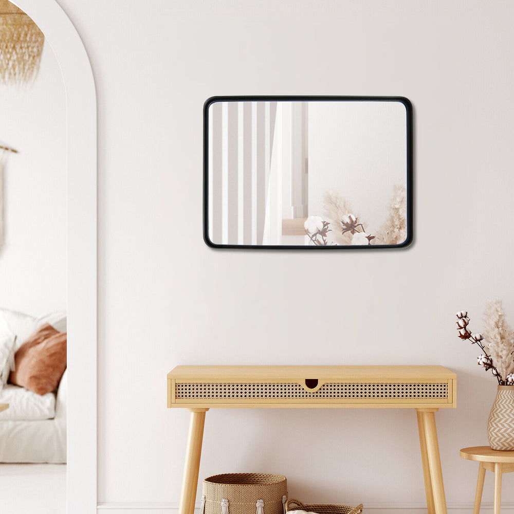 Rectangular wall mount bathroom mirror hung horizontally, featuring a sleek design and premium glass for a clear.