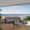 5-piece patio PE rattan wicker sofa set in gray with cushions, coffee table, and ottoman for outdoor relaxation.