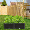 Elevated brown planter box set with lush green plants, perfect for gardening on patios, balconies, or yards.