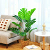 4 feet artificial Monstera Deliciosa tree with 10 vibrant leaves in a woven pot, perfect for indoor decoration.