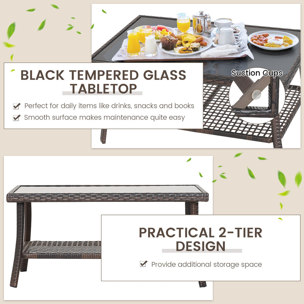Coffee table with black tempered glass top and 2-tier design, made of durable PE rattan for outdoor use.