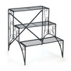 Three-tier black metal plant stand with widened grid shelves for outdoor garden and porch use, ensuring ample sunlight.