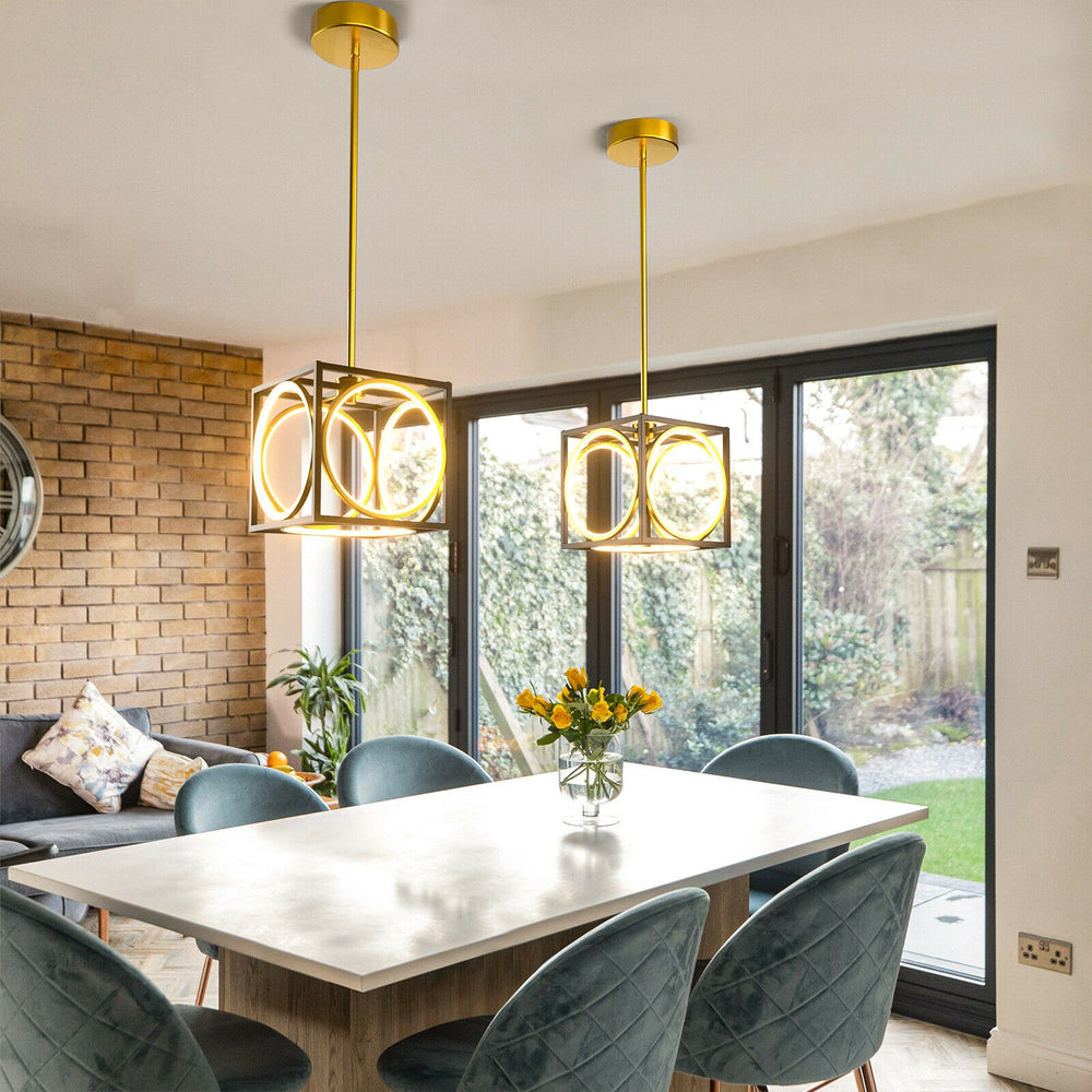 Modern LED pendant light in gold with adjustable suspender, ideal for stylish kitchen or living room illumination.