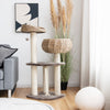 Rattan cat tree with napping perch, sisal posts, and soft cushions for comfortable lounging and scratching.
