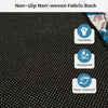 Close-up of the area rug's non-slip non-woven fabric back, showcasing its durable and waterproof features for safety.