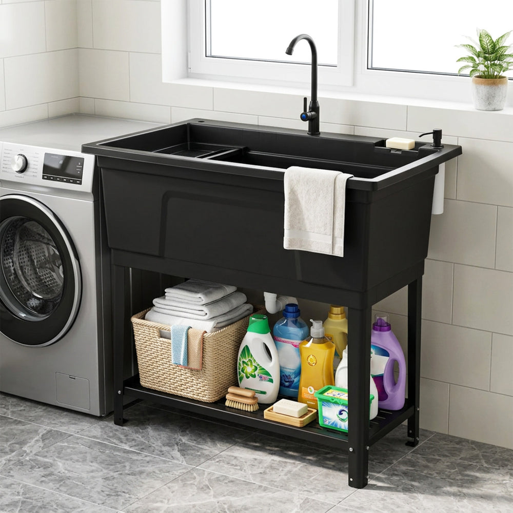 Black 100L utility sink with rotating faucet and storage shelf, ideal for laundry and cleanup, featuring a freestanding.