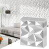 3D white PVC wall panel with diamond accent, ideal for DIY interior decoration in living rooms or offices.
