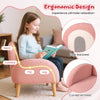 Kids armchair in pink with comfy backrest and armrests, covered in soft teddy fleece for ultimate relaxation.