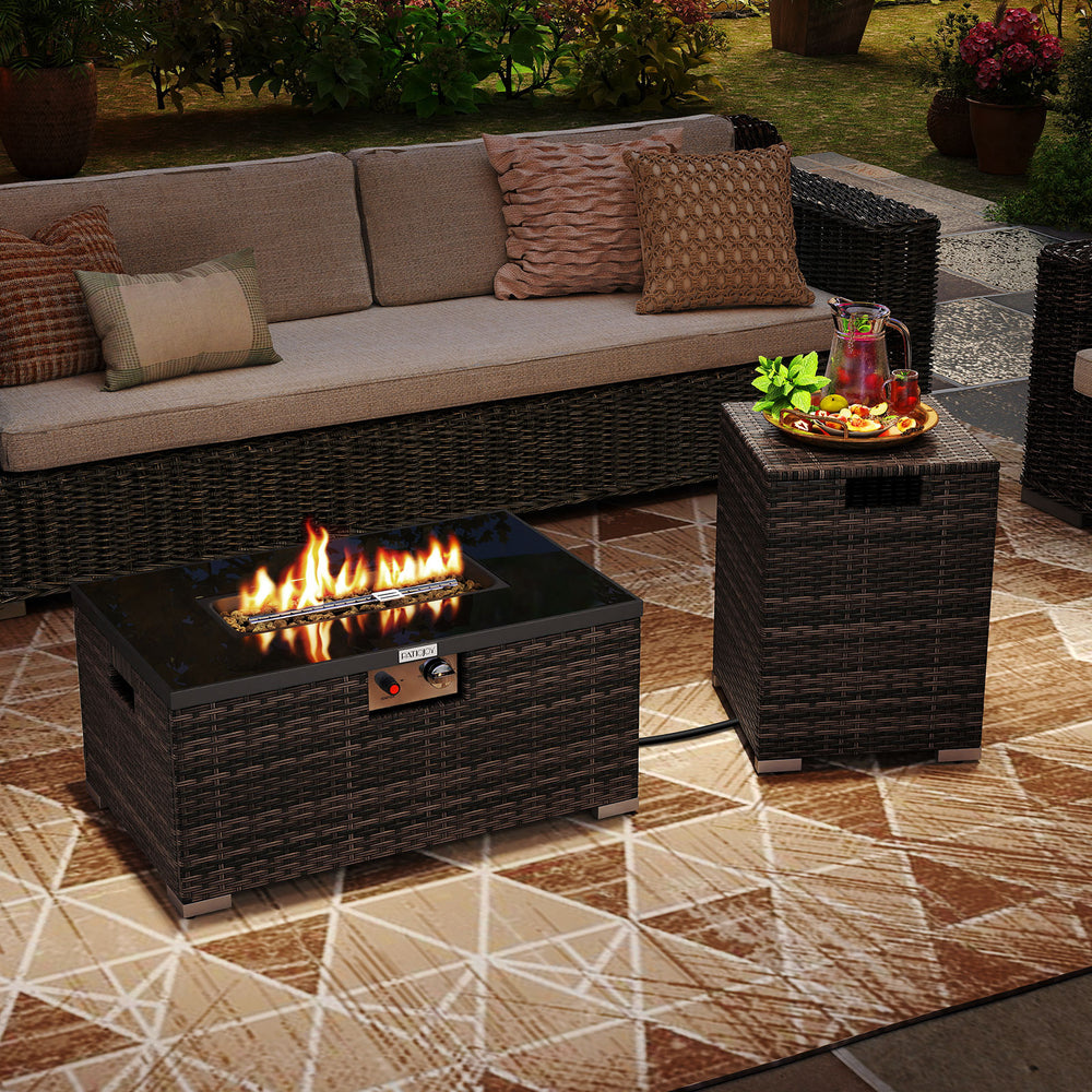 Outdoor rattan fire table set featuring a 32-inch gas firepit with a black tempered glass top for elegant outdoor.