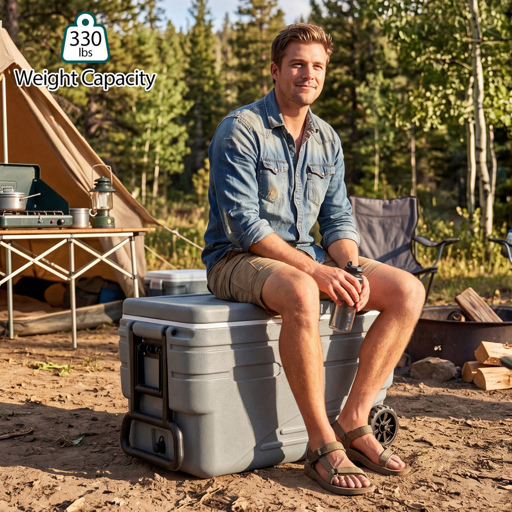 Gray 103 Quart outdoor portable wheeled ice cooler with foldable handles, designed for easy transport and ice retention.