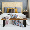 Solid acacia wood patio bench with metal legs, showcasing real wood texture, perfect for adding elegance to home décor.