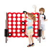 Children playing with the 3.5 feet tall Jumbo 4 to Score game set, featuring 42 jumbo rings in red for outdoor fun.