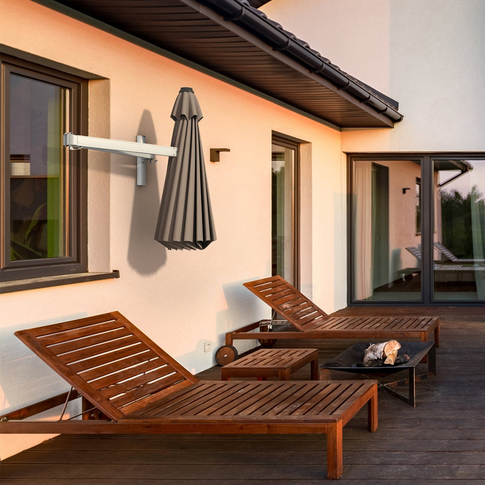 Wall-mounted 8ft tan sun shade umbrella with aluminum frame, ideal for patio or balcony use, providing effective sun.