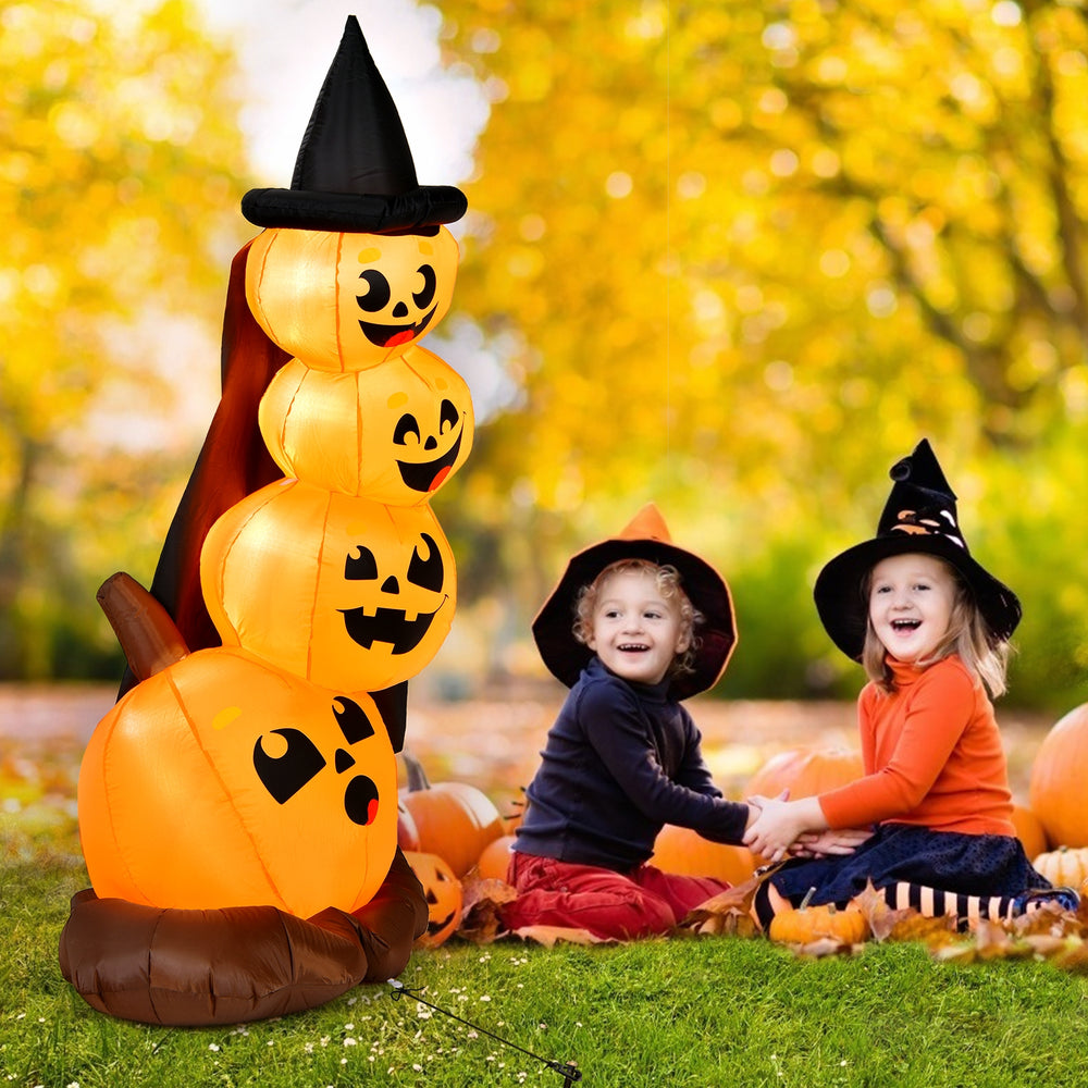 7-foot Halloween inflatable pumpkin combo with witch's hat and LED lights, featuring unique pumpkin expressions for.