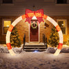10.4 feet Christmas archway with large bow and warm white LED lights, perfect for festive yard or porch decoration.
