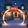 10.4 feet Christmas archway with large bow and warm white LED lights, perfect for yards and gardens during the holiday.