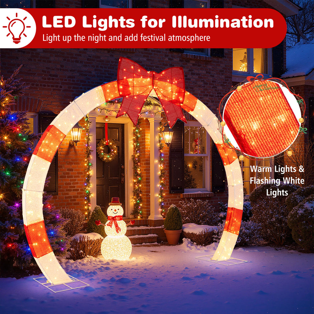 10.4 feet Christmas archway with large bow and warm white LED lights, perfect for yards and gardens during the festive.