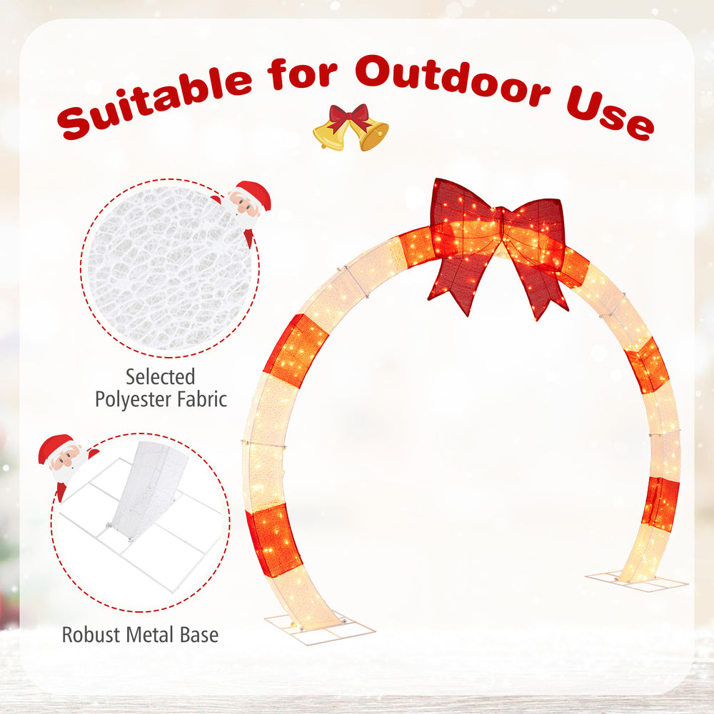 10.4 feet Christmas archway with large bow and warm white LED lights, suitable for outdoor use in gardens and yards.