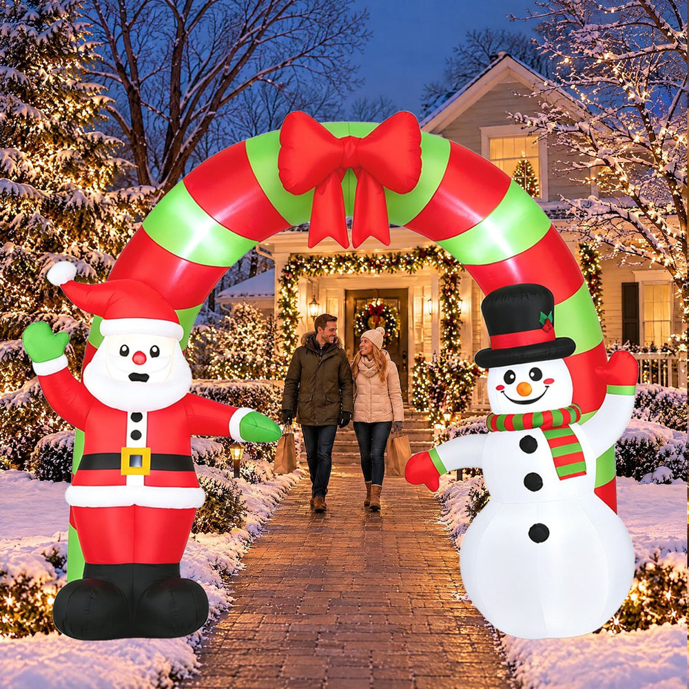 10 FT Christmas inflatable archway featuring a waving Santa and snowman with a cheerful red bow for festive outdoor decor.