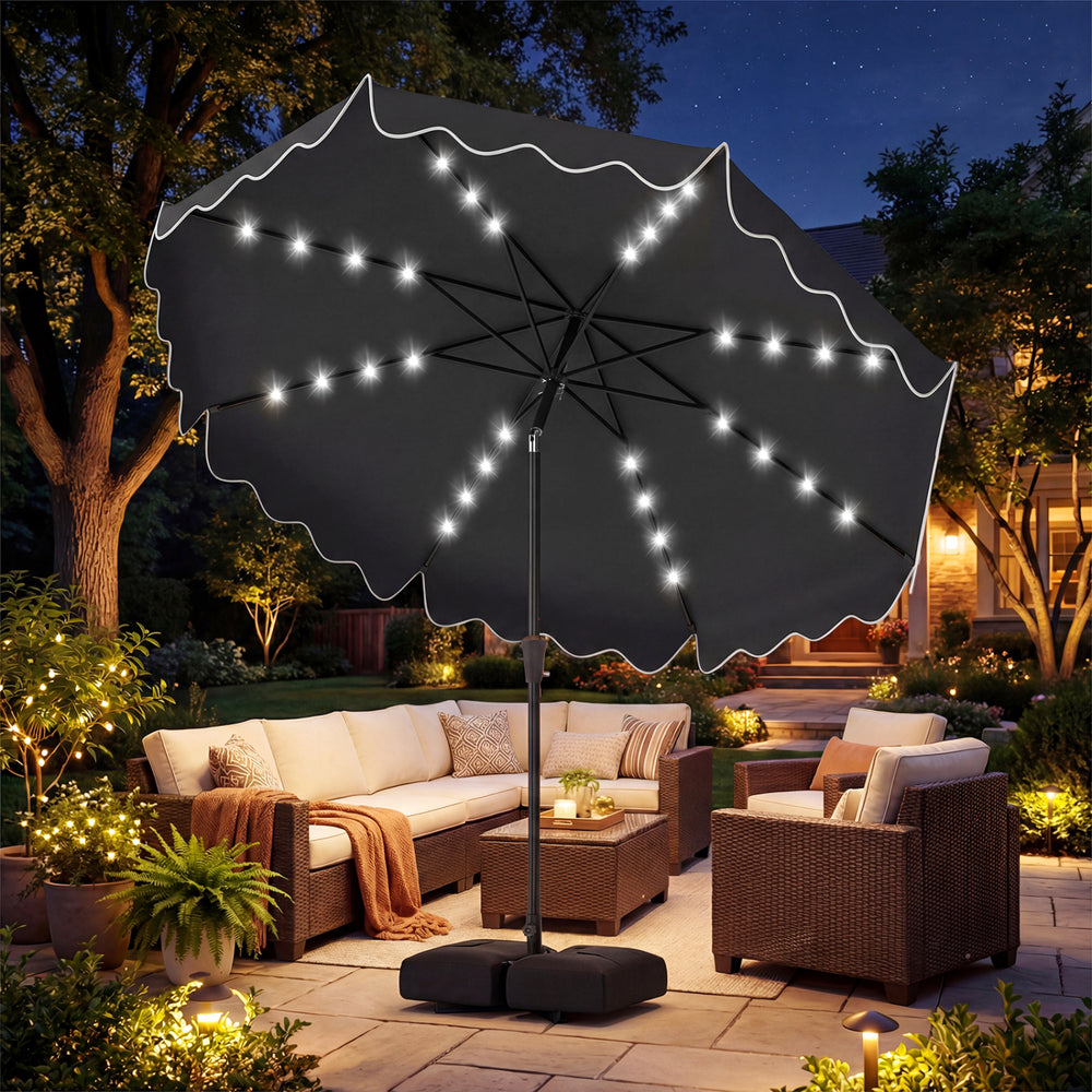 10 FT gray outdoor patio umbrella with solar LED lights, ruffled edges, and weighted base for stylish backyard shade.