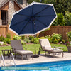 Navy 10 feet solar patio umbrella with tassels and LED lights, providing shade by the poolside for outdoor relaxation.