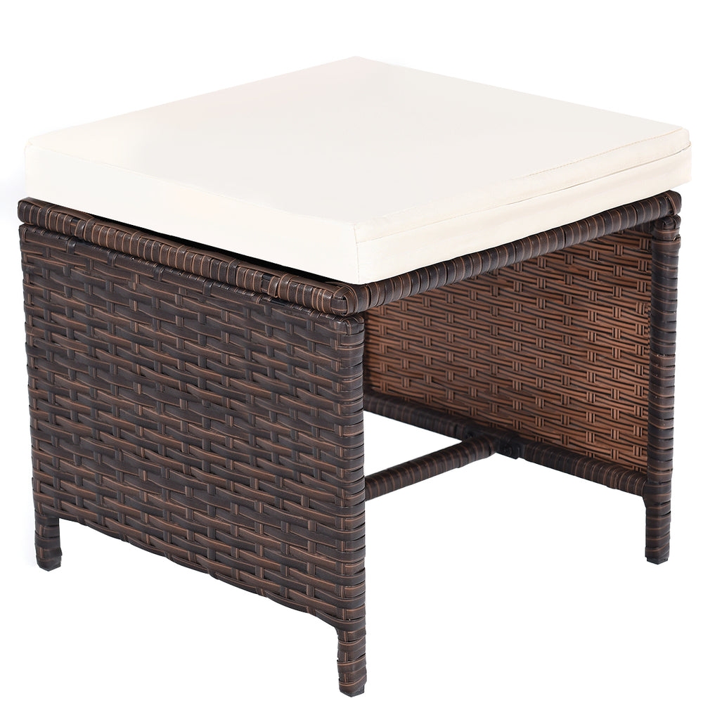 Square ottoman with removable cushion, made of brown PE wicker, perfect as a side table for outdoor patio use.