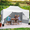 Pop up canopy tent with sidewalls and windows, providing sunshade for outdoor gatherings and events.