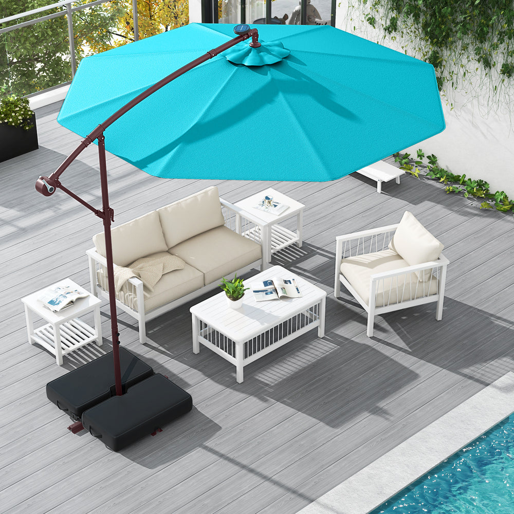 Turquoise 10 ft offset cantilever patio umbrella with solar lights, providing shade and illumination for outdoor.