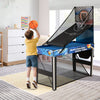 Child shooting a basketball at the 10-in-1 Combo Game Table Set, featuring a blue design and compact structure for fun.