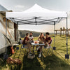 Outdoor 10 x 10 FT pop-up canopy tent in white, featuring a sturdy metal frame, ideal for picnics and events.