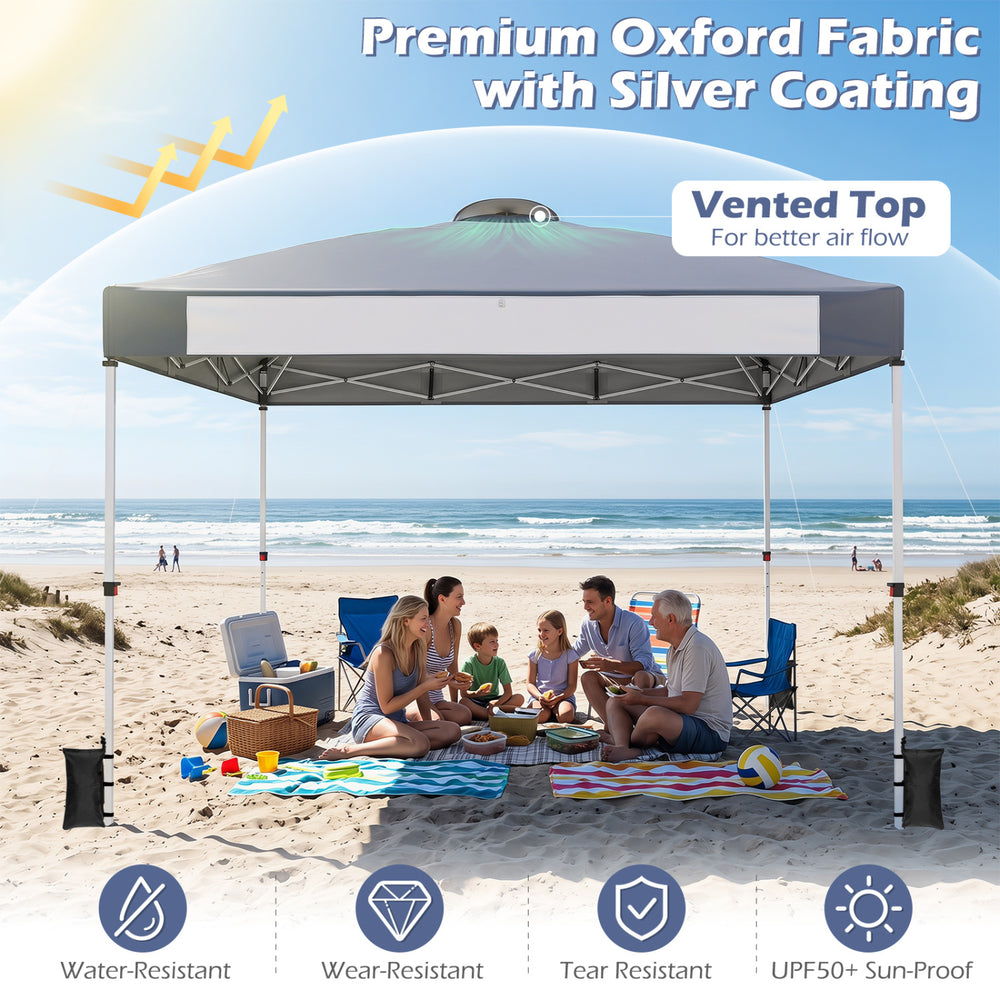 Gray 10 x 10 feet foldable pop-up canopy with vented top, ideal for outdoor events, camping, and family gatherings.