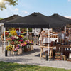 Black 10 x 10 feet outdoor commercial pop-up canopy tent with sturdy frame, adjustable height, and easy installation.