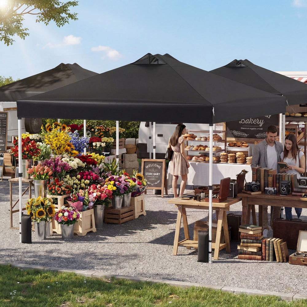 Black 10 x 10 feet outdoor commercial pop-up canopy tent with sturdy frame, adjustable height, and easy installation.