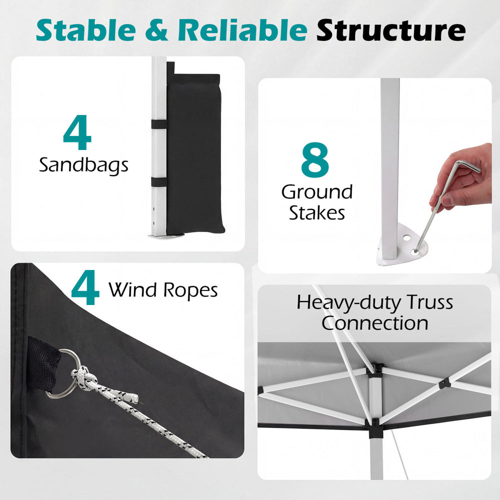 Detail of the 10 x 10 feet outdoor pop-up canopy tent showing stability features like sandbags, ground stakes, and wind.