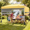Pop up canopy tent in yellow with dual adjustable awnings, providing shade for outdoor gatherings and BBQs.